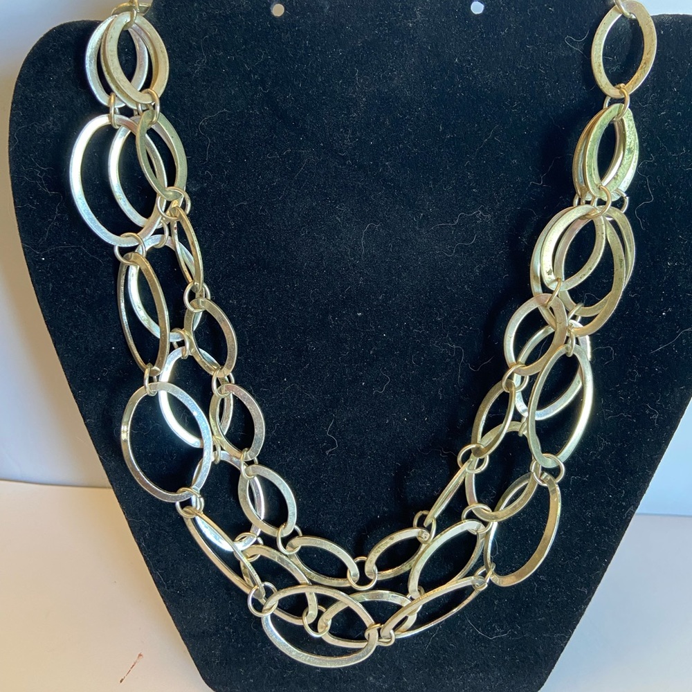 Multi-chain interlocking oval silvertone necklace